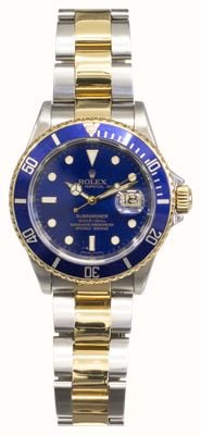 Pre-owned Rolex Submariner 2006 OP Date (40mm) Blue Dial / Two-Tone Stainless Steel - 16613 - Box & Papers J61040