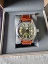 Customer picture of Hamilton Khaki Field Automatic (42mm) Khaki Green Sunray Dial / Brown Leather Strap H70605560